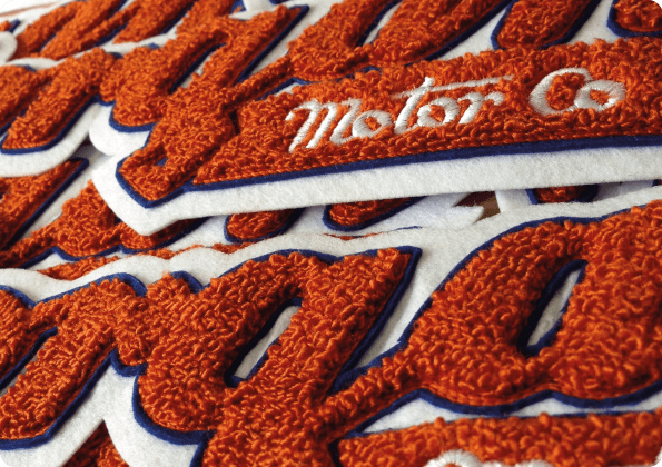 Luxury in Detail: Close-Up of Chenille Patch for Morgan Motor Cars, A Symbol of Timeless Elegance