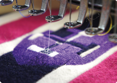 Collegiate Prestige: Multi-Colour Complex Embroidery Logo Stitched on Polo Shirt for an Oxford University College